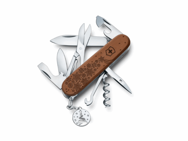 mittleres taschenmesser climber wood winter magic limited edition 2025 weihnachtsmesser limitiertes taschenmesser mit holzschale und weihnachtlicher grauvur und zusätzlicher weihnachtsanhänger silber